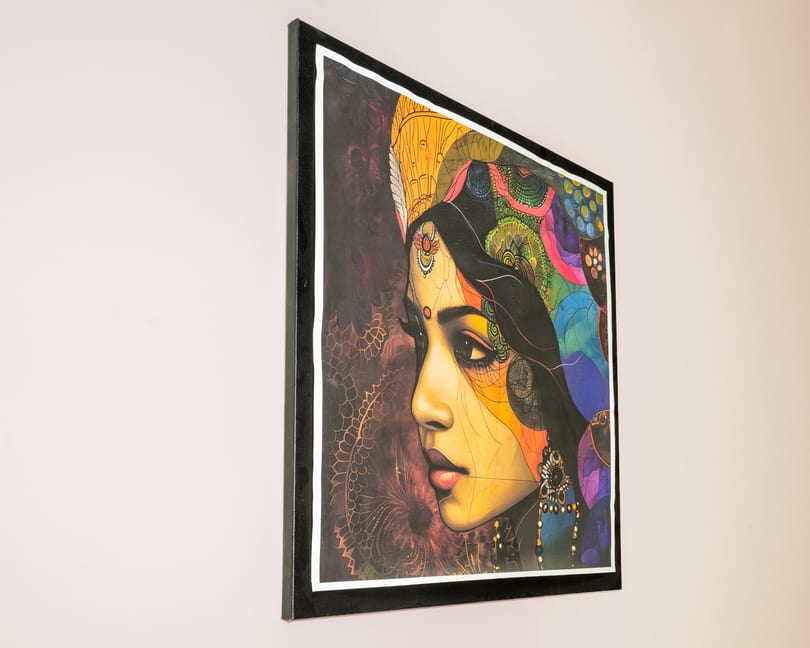 Colorful painting of a woman's profile with intricate patterns and a dark background.